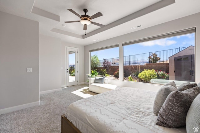 1867 W Grapevine, Hurricane, UT 84737 - carpeted bedroom with a tray ceiling, access to outside, baseboards, and ceiling fan
