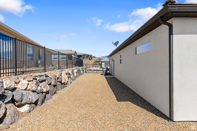 1867 W Grapevine, Hurricane, UT 84737 - view of property exterior with fence and stucco siding