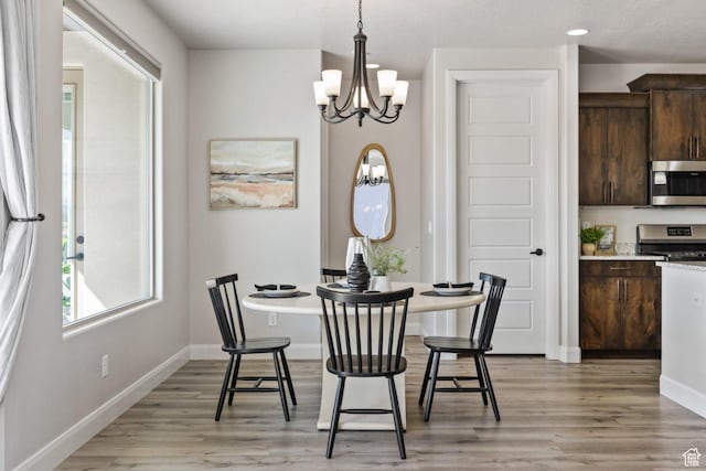 1867 W Grapevine, Hurricane, UT 84737 - dining area with a chandelier, light wood-style floors, baseboards, and recessed lighting