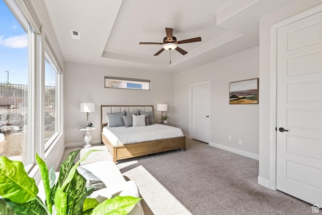 1867 W Grapevine, Hurricane, UT 84737 - carpeted bedroom with a tray ceiling, baseboards, and a ceiling fan