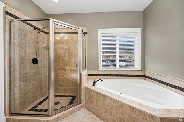 240 Bugle Way, Providence, UT 84332 - bathroom featuring a garden tub, a stall shower, and tile patterned flooring