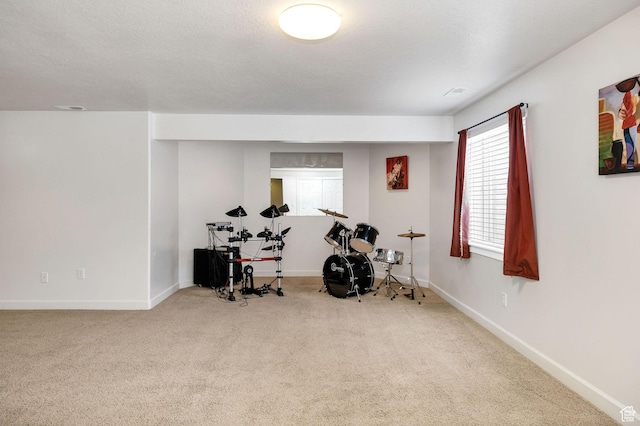 240 Bugle Way, Providence, UT 84332 - exercise room featuring carpet floors, baseboards, visible vents, and a textured ceiling