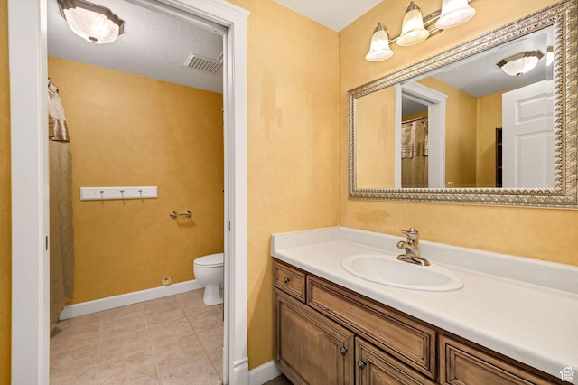 240 Bugle Way, Providence, UT 84332 - bathroom featuring tile patterned floors, toilet, vanity, baseboards, and visible vents