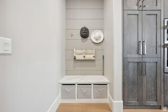 mudroom featuring baseboards