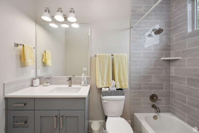 full bath with bathing tub / shower combination, toilet, and vanity
