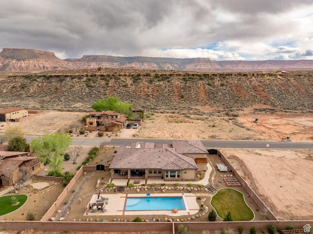 drone / aerial view featuring a mountain view