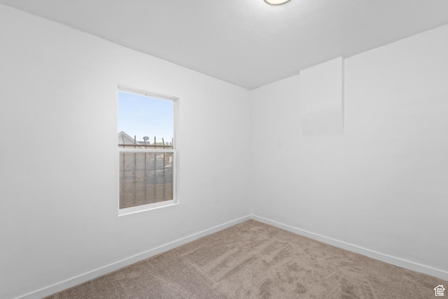 2814 S 9100 W, Magna, UT 84044 - empty room featuring carpet flooring and baseboards