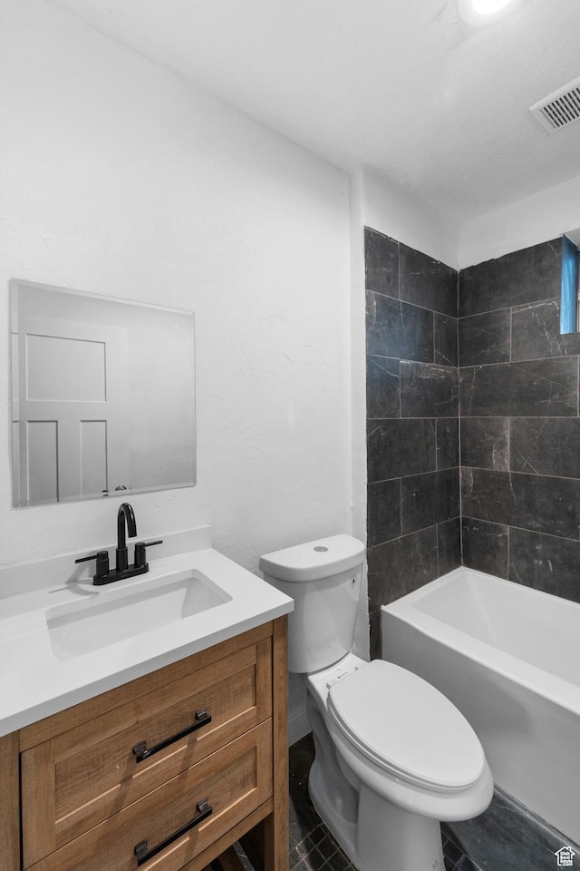 2814 S 9100 W, Magna, UT 84044 - bathroom featuring vanity, toilet, and bathing tub / shower combination