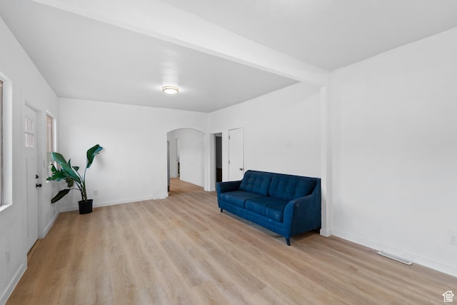 2814 S 9100 W, Magna, UT 84044 - unfurnished room with arched walkways, light wood-style floors, and baseboards