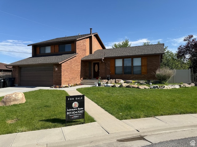 120 E Deseret Cir, Grantsville, UT 84029 - view of front of house featuring driveway, a garage, brick siding, and roof with shingles
