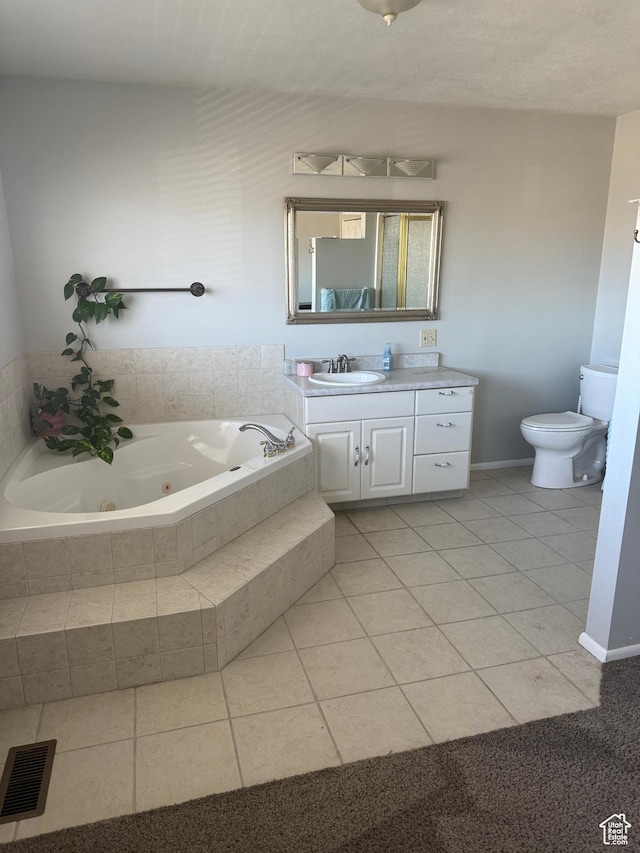 120 E Deseret Cir, Grantsville, UT 84029 - bathroom featuring a whirlpool tub, tile patterned floors, vanity, and toilet
