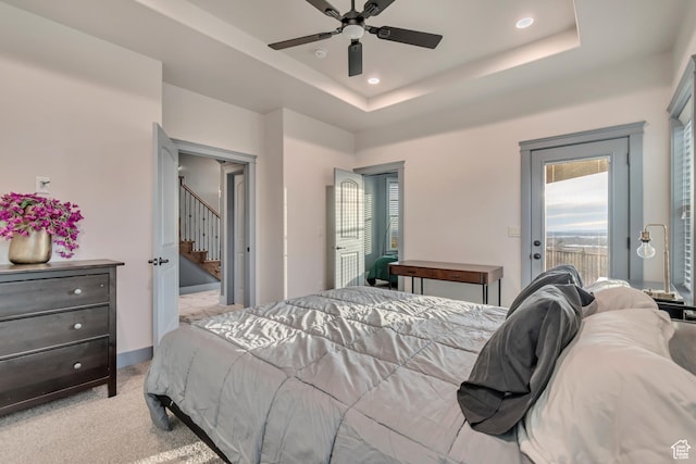 692 N Harrison Blvd, Ogden, UT 84404 - bedroom featuring access to outside, light carpet, a tray ceiling, recessed lighting, and a ceiling fan