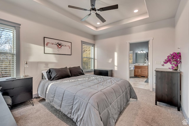 692 N Harrison Blvd, Ogden, UT 84404 - bedroom with multiple windows, light colored carpet, recessed lighting, and a tray ceiling