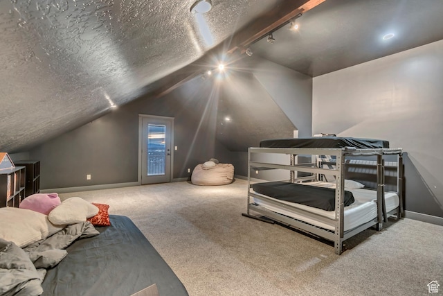 692 N Harrison Blvd, Ogden, UT 84404 - bedroom featuring vaulted ceiling, access to outside, carpet floors, baseboards, and rail lighting