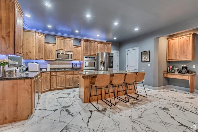 692 N Harrison Blvd, Ogden, UT 84404 - kitchen featuring appliances with stainless steel finishes, a kitchen breakfast bar, recessed lighting, decorative backsplash, and a kitchen island