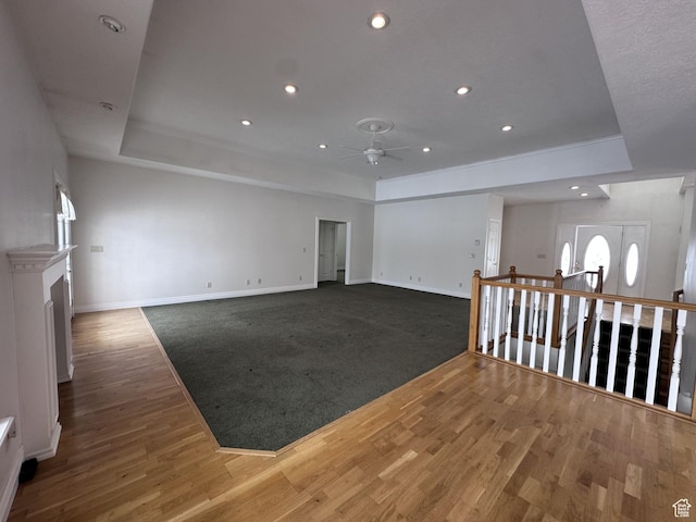 28848 N 11170 E, Milburn, UT 84629 - empty room featuring baseboards, wood finished floors, recessed lighting, a ceiling fan, and a raised ceiling