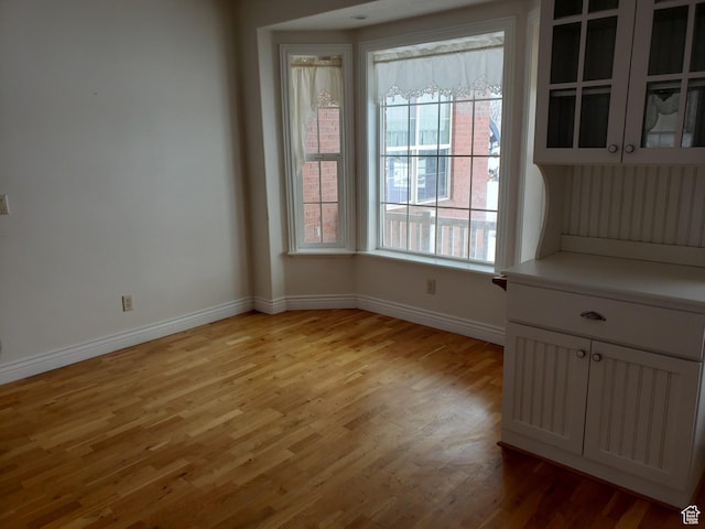 28848 N 11170 E, Milburn, UT 84629 - unfurnished dining area with light wood finished floors and baseboards
