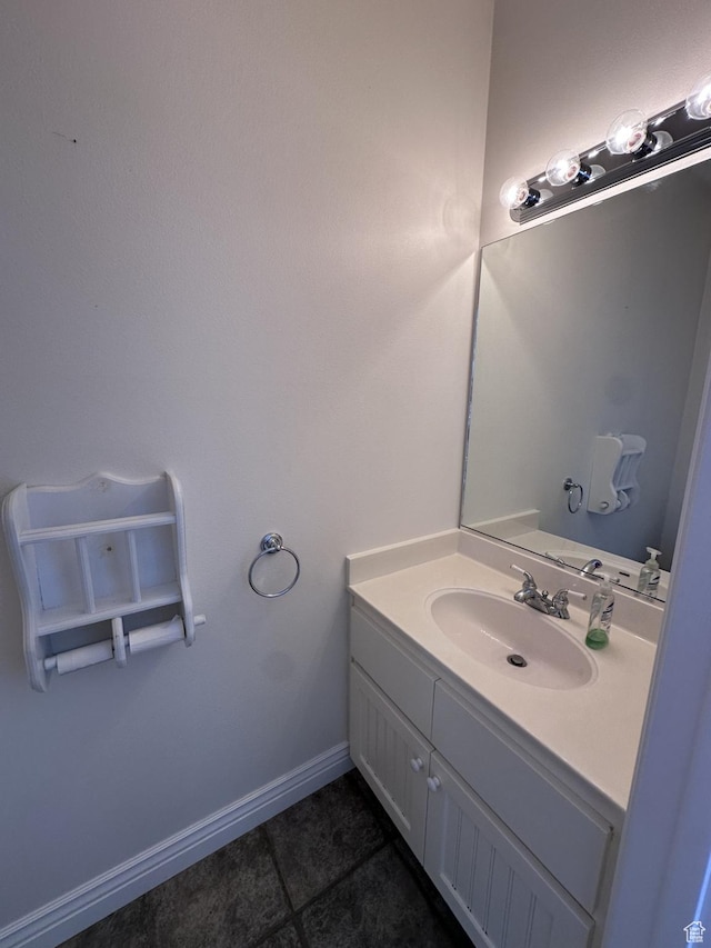 28848 N 11170 E, Milburn, UT 84629 - bathroom with tile patterned floors, vanity, and baseboards