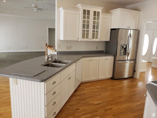 28848 N 11170 E, Milburn, UT 84629 - kitchen featuring a sink, a ceiling fan, light wood-type flooring, white dishwasher, and stainless steel refrigerator with ice dispenser