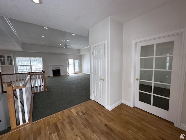 28848 N 11170 E, Milburn, UT 84629 - interior space with an upstairs landing, a textured ceiling, baseboards, wood finished floors, and recessed lighting