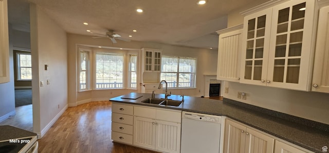 28848 N 11170 E, Milburn, UT 84629 - kitchen featuring a peninsula, white appliances, ceiling fan, recessed lighting, and a sink