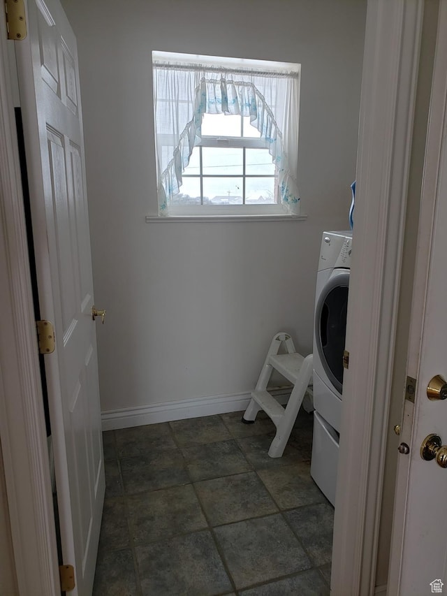 28848 N 11170 E, Milburn, UT 84629 - laundry area with baseboards, washer / clothes dryer, and laundry area
