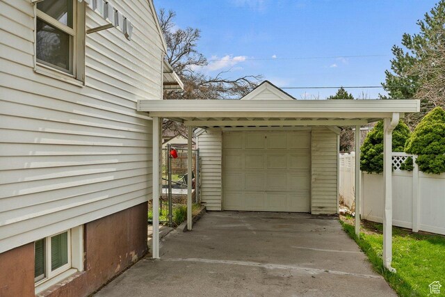 1335 Swan St, Ogden, UT 84401 - detached garage with driveway and fence