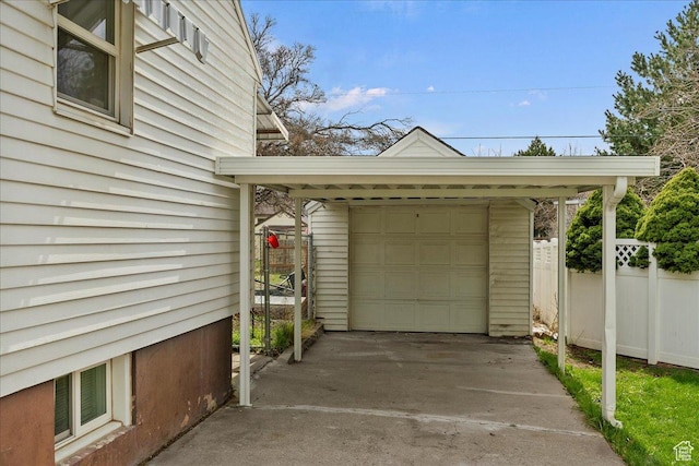 1335 Swan St, Ogden, UT 84401 - detached garage featuring concrete driveway and fence