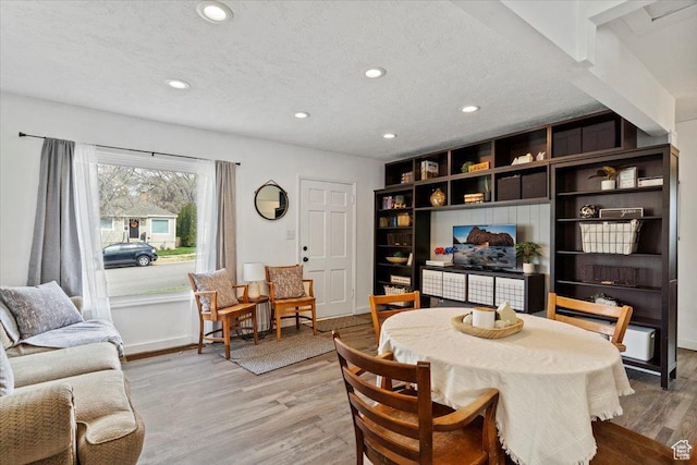 1335 Swan St, Ogden, UT 84401 - dining space featuring recessed lighting, light wood-type flooring, a textured ceiling, and baseboards