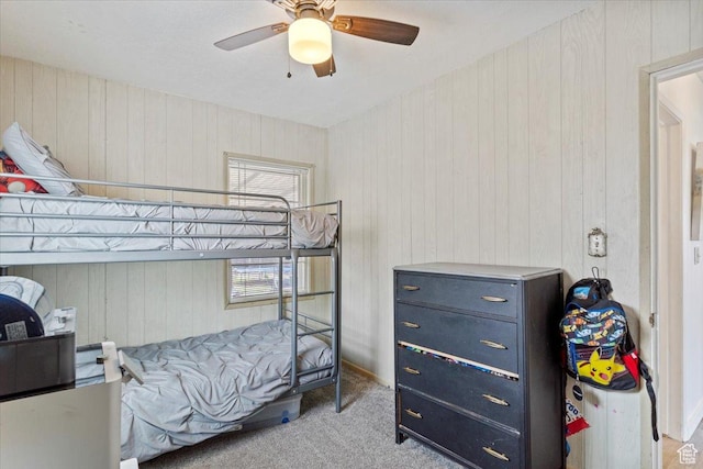 1335 Swan St, Ogden, UT 84401 - carpeted bedroom featuring wood walls