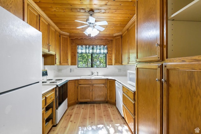 605 E 400 N, Richfield, UT 84701 - kitchen featuring white appliances, light wood-type flooring, a sink, brown cabinetry, and ceiling fan