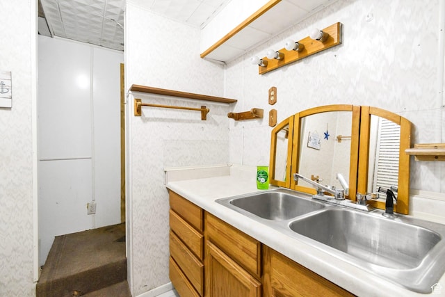 605 E 400 N, Richfield, UT 84701 - kitchen featuring open shelves, a sink, light countertops, brown cabinets, and wallpapered walls