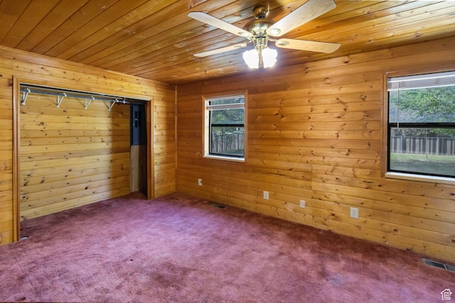 605 E 400 N, Richfield, UT 84701 - carpeted spare room featuring wood ceiling, wooden walls, and ceiling fan