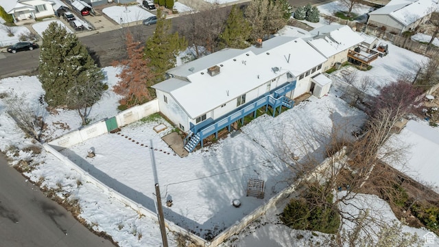 snowy aerial view featuring a residential view
