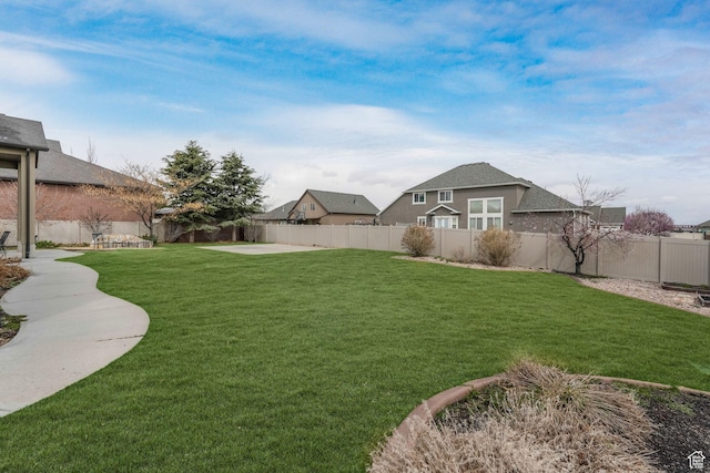view of yard featuring a fenced backyard and a patio area