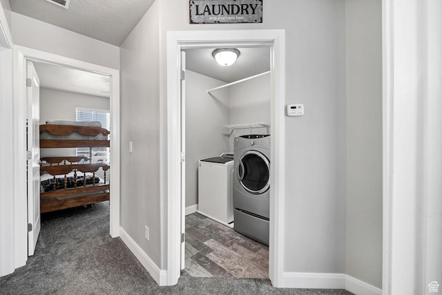802 W 1060 S, Logan, UT 84321 - washroom featuring baseboards, dark carpet, laundry area, and washer and clothes dryer