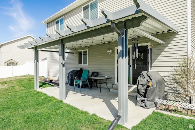 802 W 1060 S, Logan, UT 84321 - rear view of house featuring a yard, fence, and a patio
