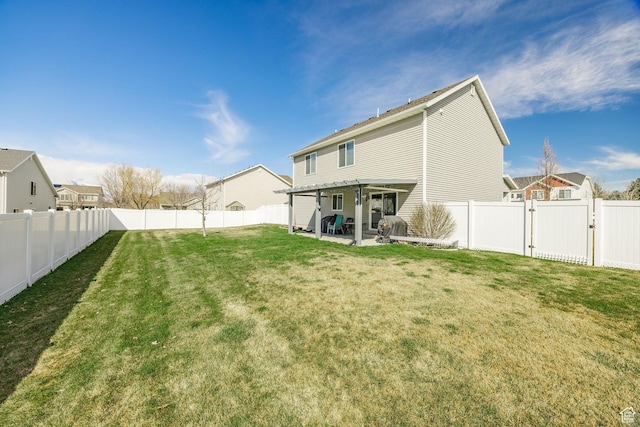 802 W 1060 S, Logan, UT 84321 - rear view of property with a gate, a fenced backyard, a yard, and a patio area