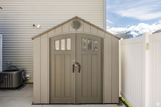 802 W 1060 S, Logan, UT 84321 - view of shed featuring central AC unit and fence