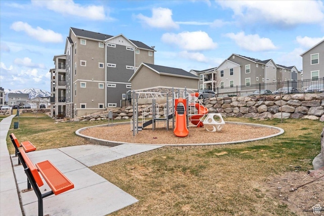1816 W Eaglewood Dr Unit 101, Saratoga Springs, UT 84045 - community play area featuring a residential view, fence, and a yard