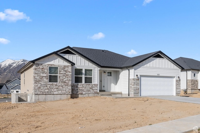 1651 E 900 N Unit 16, Spanish Fork, UT 84660 - view of front of house featuring board and batten siding, stone siding, and concrete driveway