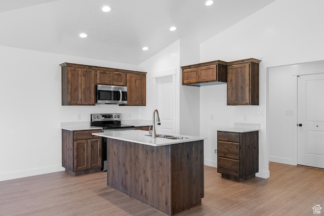 1651 E 900 N Unit 16, Spanish Fork, UT 84660 - kitchen with a sink, light countertops, light wood finished floors, vaulted ceiling, and stainless steel appliances