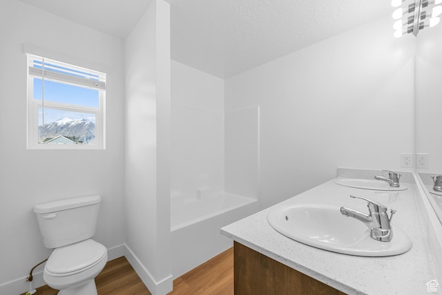 1651 E 900 N Unit 16, Spanish Fork, UT 84660 - bathroom with double vanity, a sink, toilet, and wood finished floors