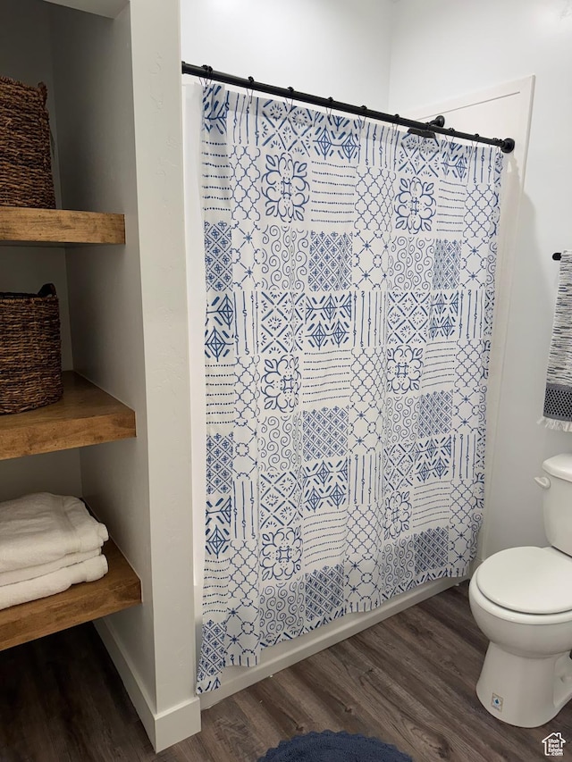 142 S 3500 W, Maeser, UT 84078 - full bath with a shower with curtain, toilet, baseboards, and wood finished floors