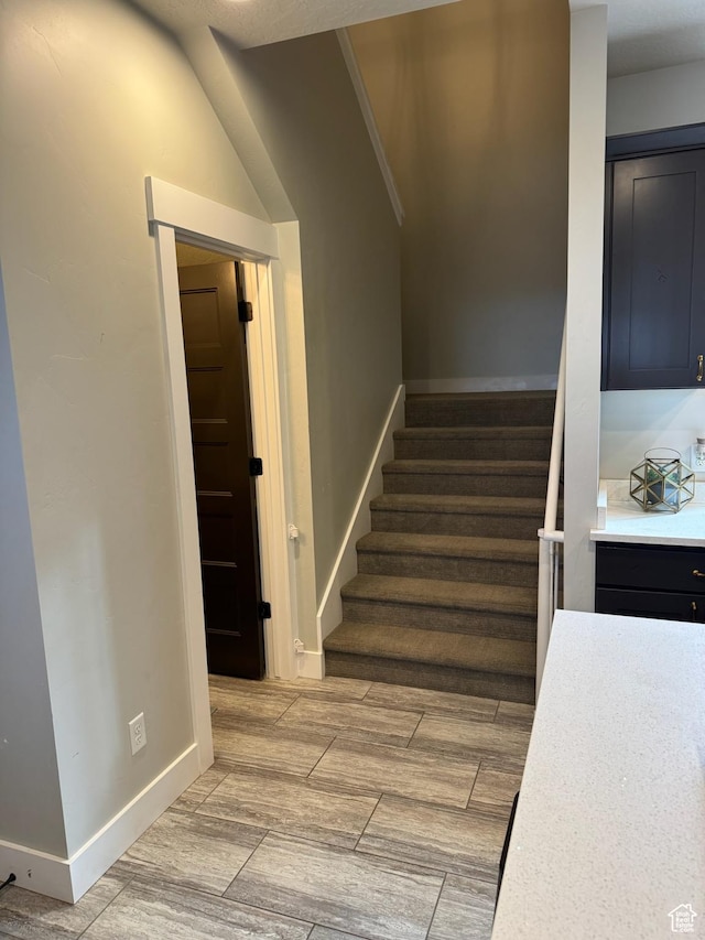 142 S 3500 W, Maeser, UT 84078 - stairway with wood tiled floor and baseboards