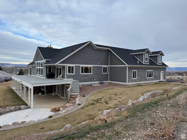 142 S 3500 W, Maeser, UT 84078 - back of property with a lawn and stairway