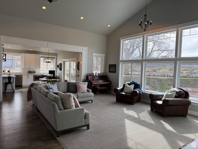 142 S 3500 W, Maeser, UT 84078 - living area with an inviting chandelier, high vaulted ceiling, a healthy amount of sunlight, and recessed lighting