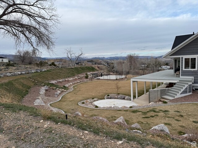 142 S 3500 W, Maeser, UT 84078 - view of yard with a mountain view and a patio