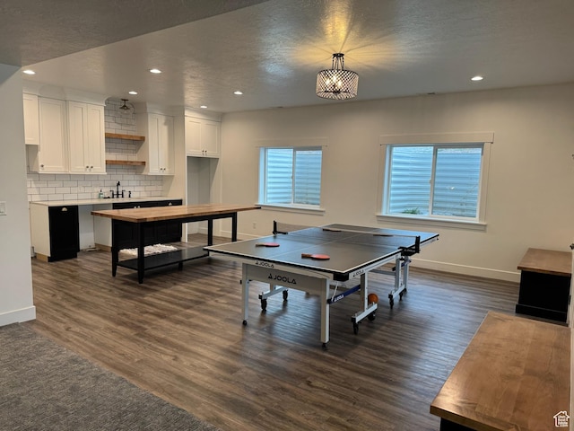 142 S 3500 W, Maeser, UT 84078 - game room with dark wood-type flooring, baseboards, recessed lighting, and a sink