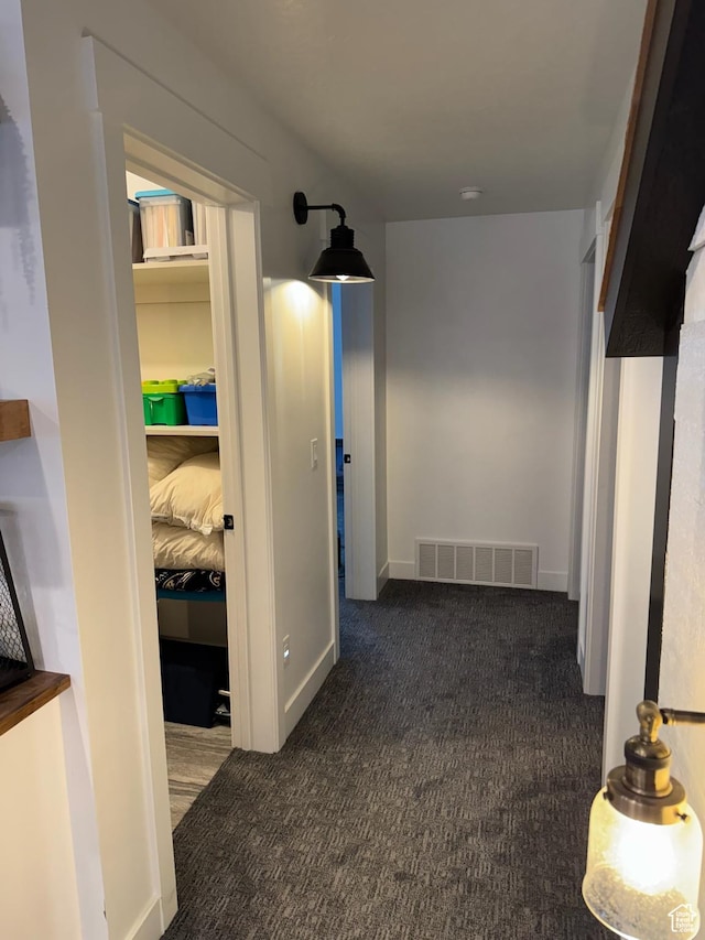 142 S 3500 W, Maeser, UT 84078 - hall featuring baseboards, visible vents, and dark carpet